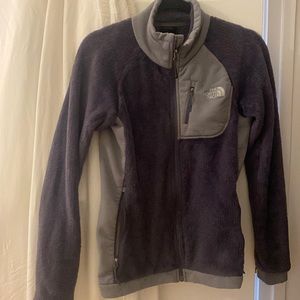 Purple north face sweater s/p with front pocket and 2 zipper pockets
